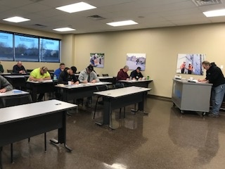 Contractors learning in a classroom setting