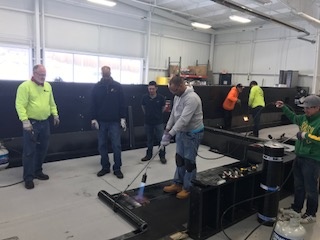Contractors learning with hands-on training